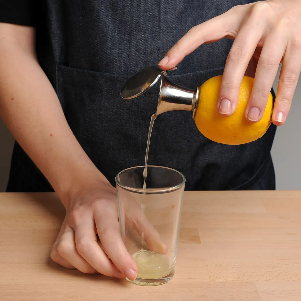 Citruspers met dopje, roestvrij staal