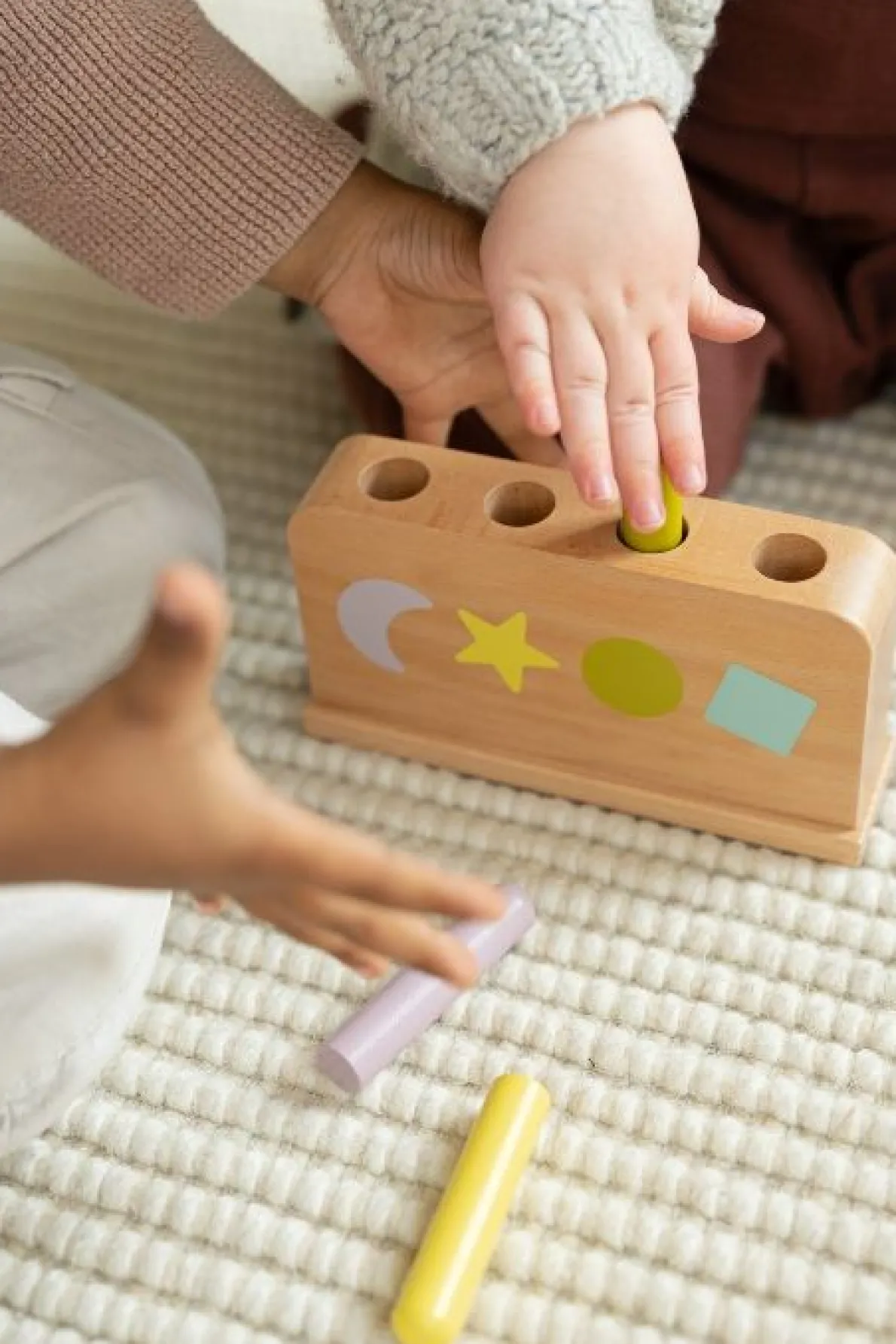 Springpinnen, hout, babyspeelgoed